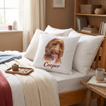 Color Pencil Throw Pillow 18"X18" resting against the pillows on a bed