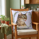 Custom Herb Wreath Throw Pillow 18"X18" on the seat of a chair
