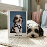 High School Photo Pet Notebook. A real small shaggy black-and-white Havanese mix with a white face and dark ears resting its chin on a cream rug next to the white hardcover notebook, soft daylight from a window.