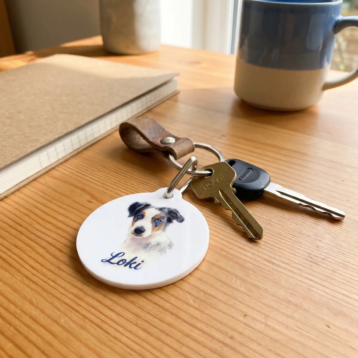 Pencil Art Keychain on a desk