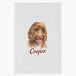 Colored pencil portrait of an apricot labradoodle printed on a soft white fleece blanket, with the name "Cooper" drawn below.