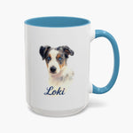 Colored pencil portrait of a blue merle Australian shepherd puppy on a 15 oz mug with a light blue handle, with the name "Loki" drawn below.